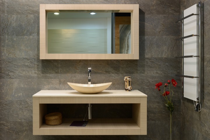 Modern sanded wood bathroom vanity set.