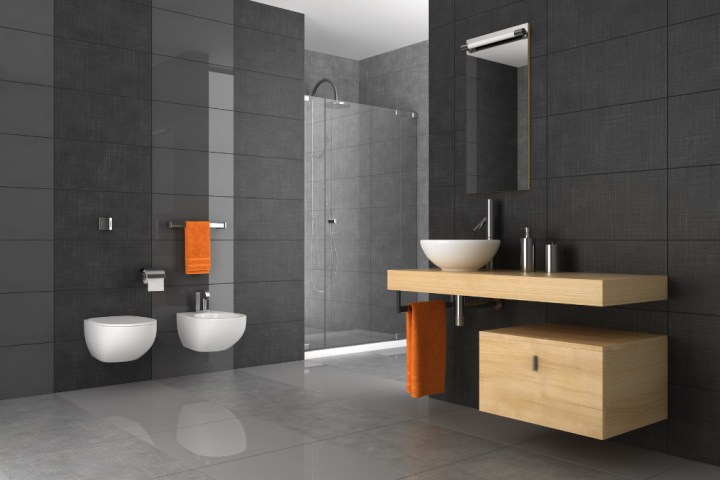 Wood mounted vanity set in bathroom with gray walls. 