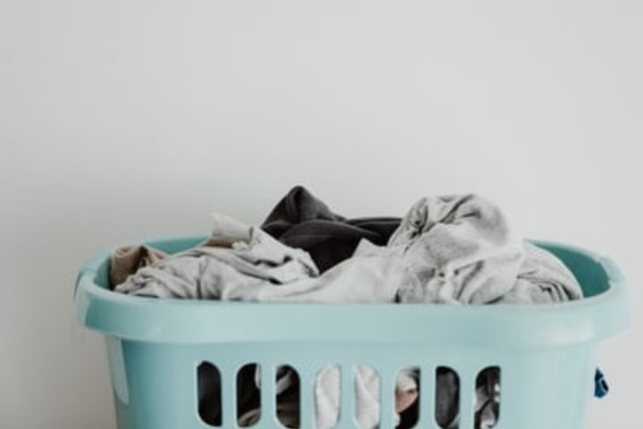 Move laundry basket as part of laundry room storage ideas