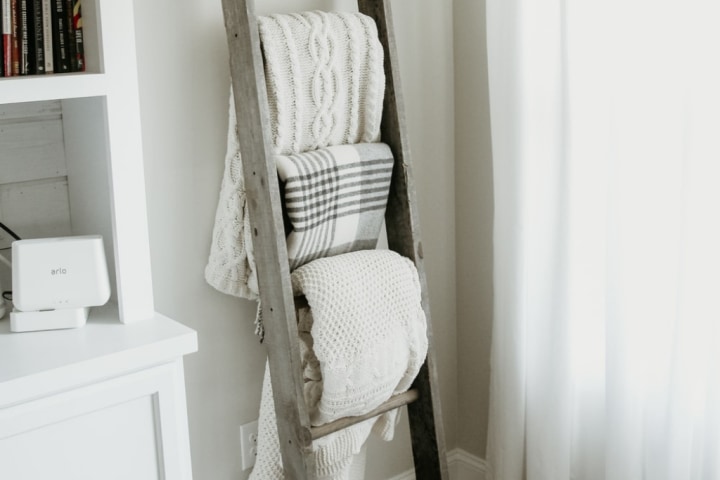 DIY Towel Ladder Alt text: Ladder towel rack - bathroom furniture ideas from Shelf Genie