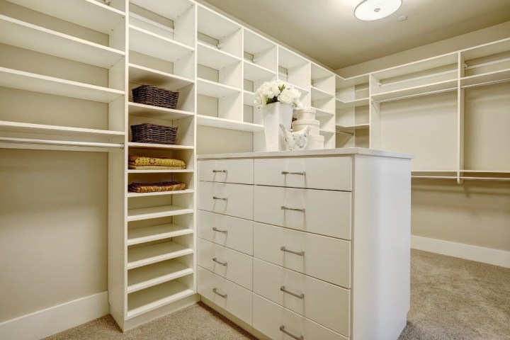 Huge-walk-in-closet-with-shelves.jpg