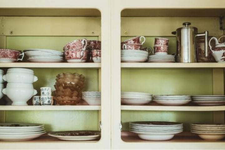 open-cabinet-with-stack-of-bowls.jpg