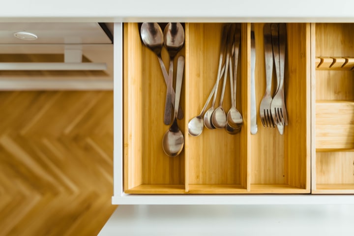 Wooden utensils drawer with compartments