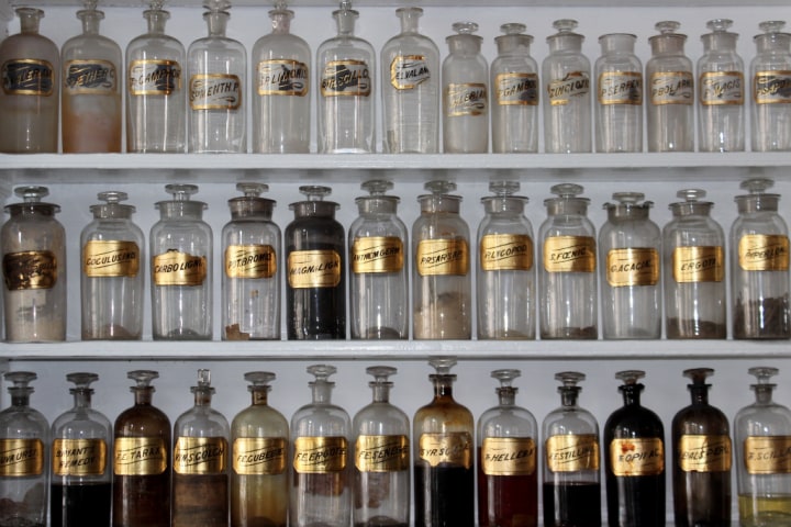 Jars of spices with gold labels