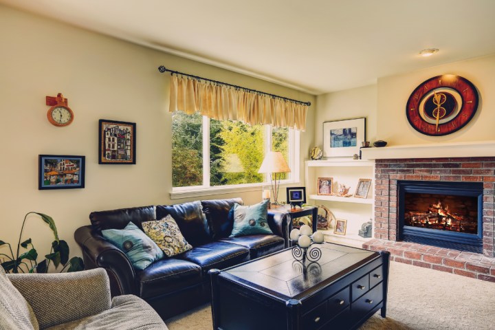 Adding a coffee table with drawers is a great living room storage idea to organize and declutter your space.