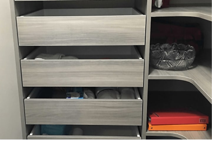 Custom glide-out shelves for creative spaces