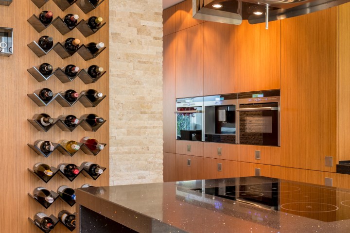 Wall art that doubles as wine storage is an eye-catching and functional.