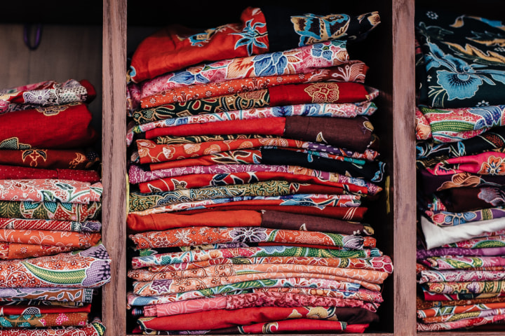 cubby shelving, folded fabrics