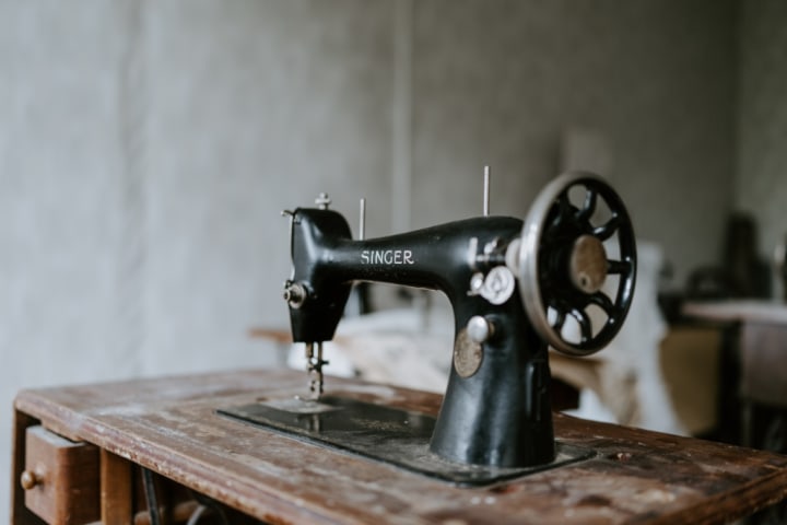 sewing machine, threaded needle