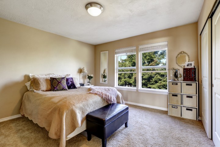 Bedroom with ottoman storage