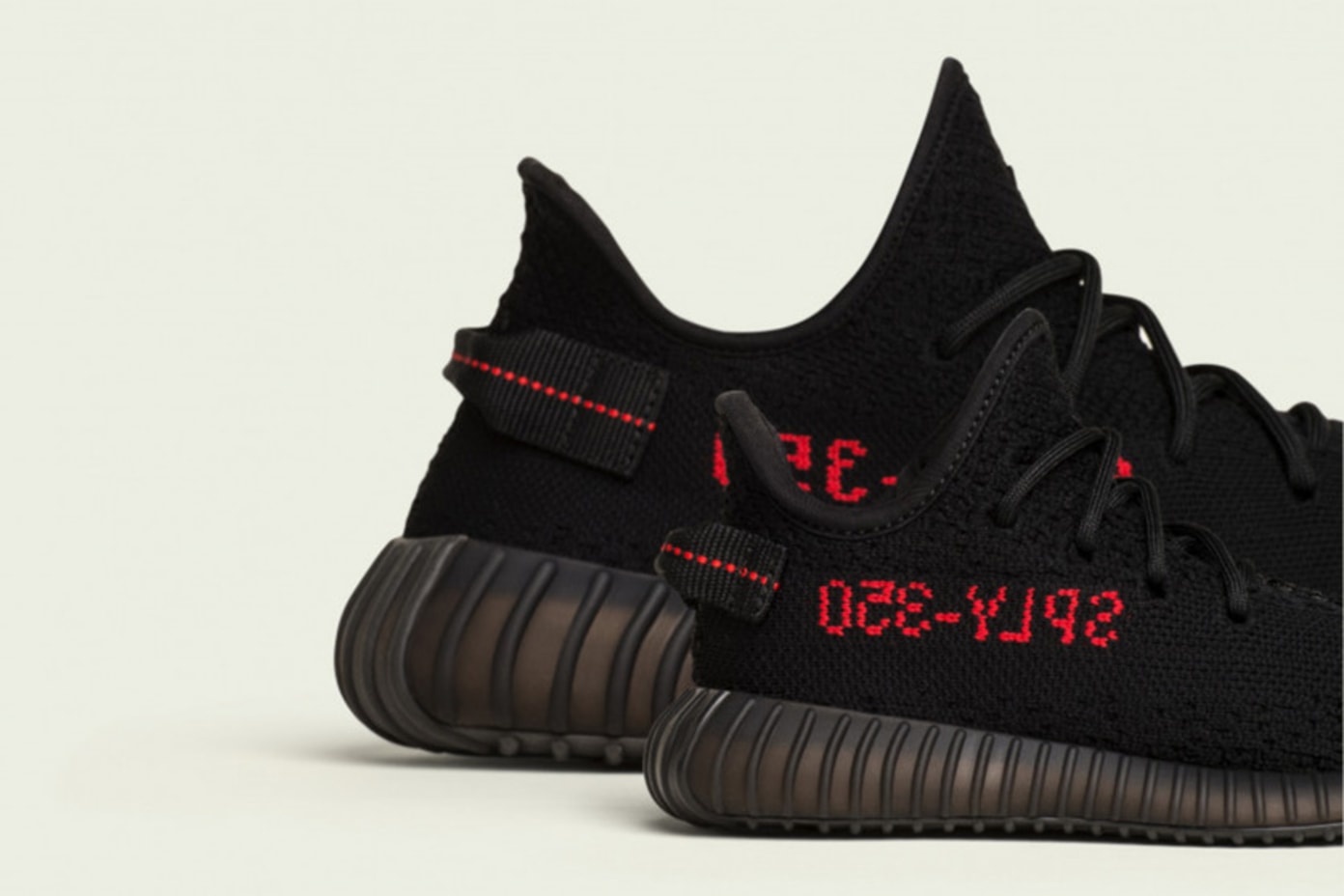 yeezy black with red letters