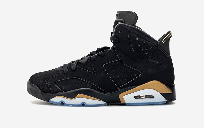 gold and black 6 jordans