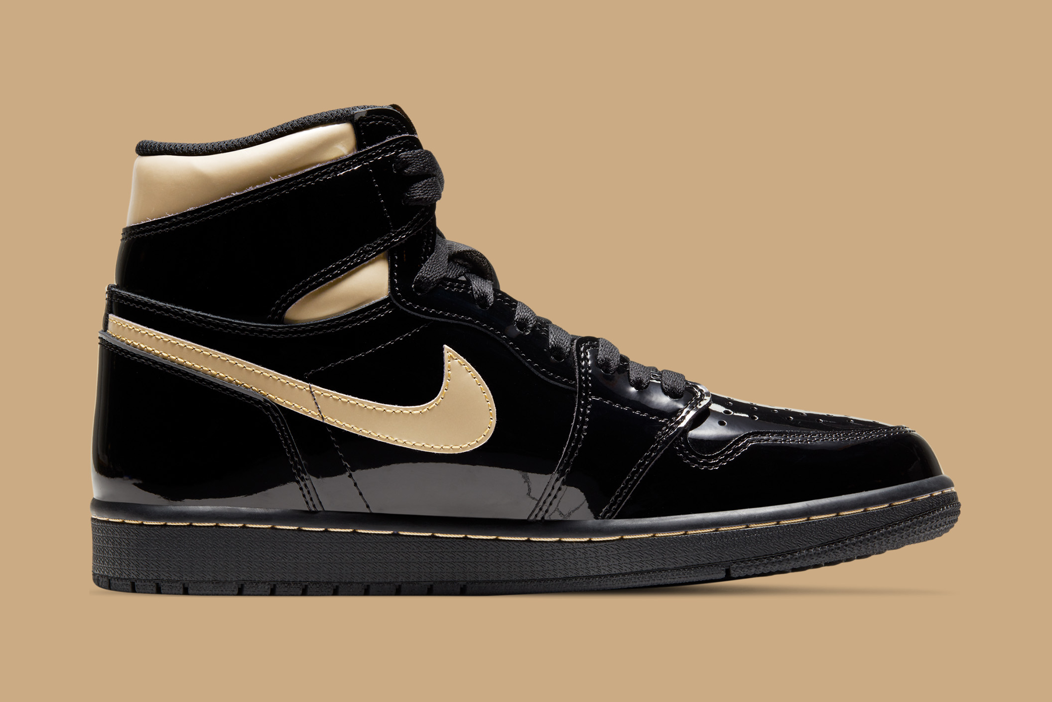 black and metallic gold jordans