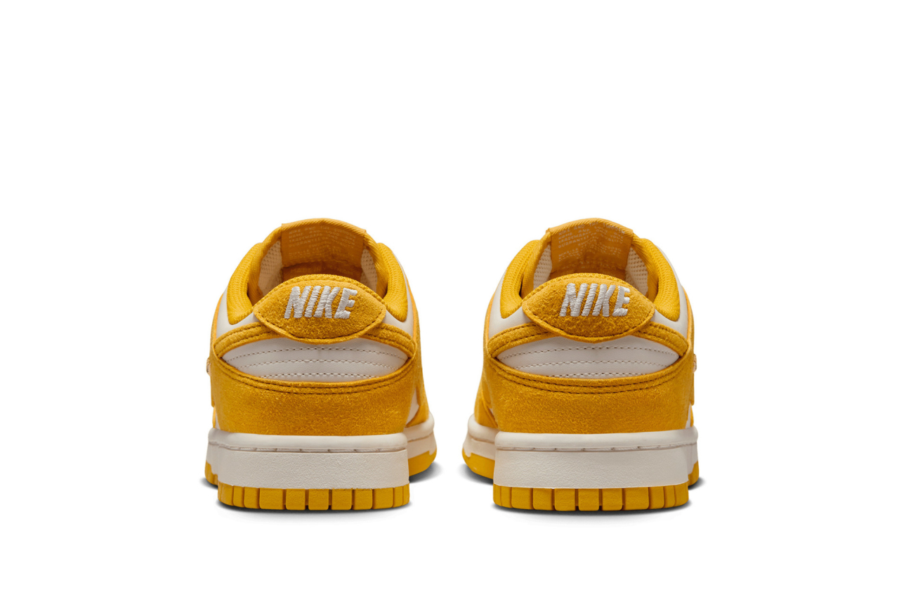 gold nike swoosh shoes