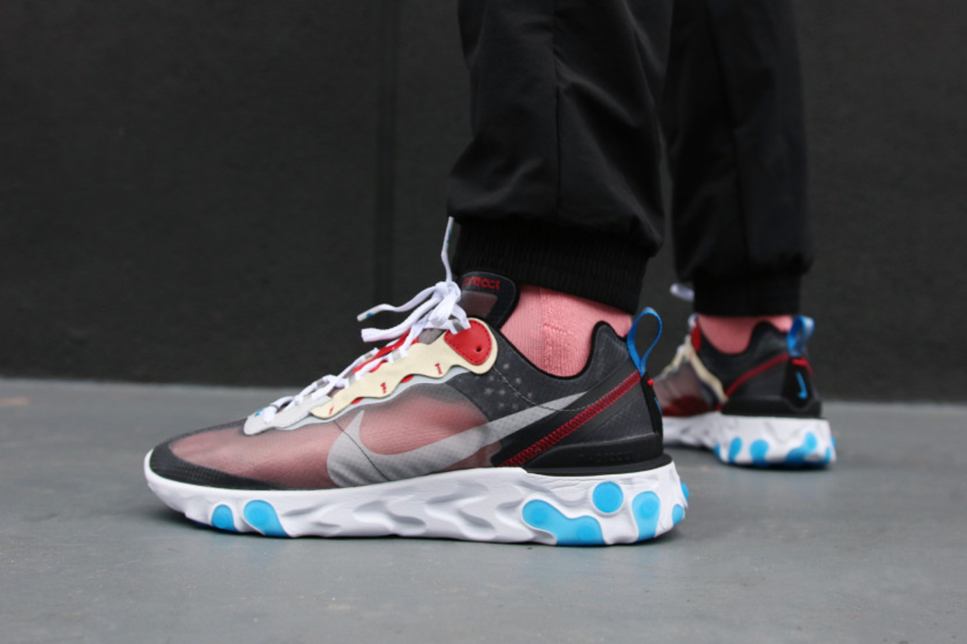 nike react element 87 solar red on feet