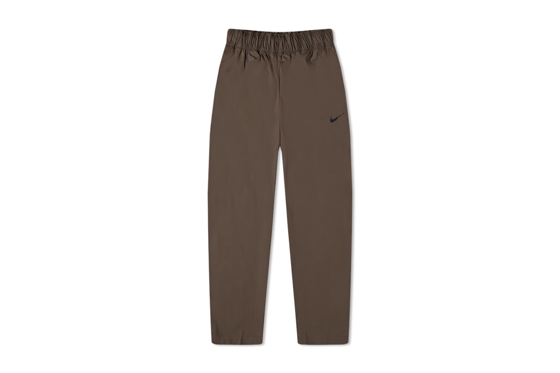 Buy Nike Sportswear Essential Woven Pants Black in UAE