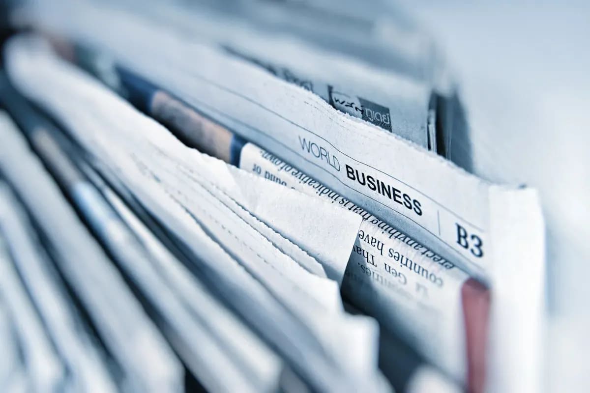 Stacked newspapers representing a blog