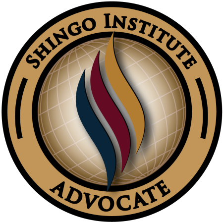 the Shingo Advocate badge. A round badge with the shingo flame in the center and a globe in the gold background