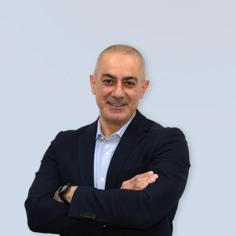 Doğan Hasan headshot.