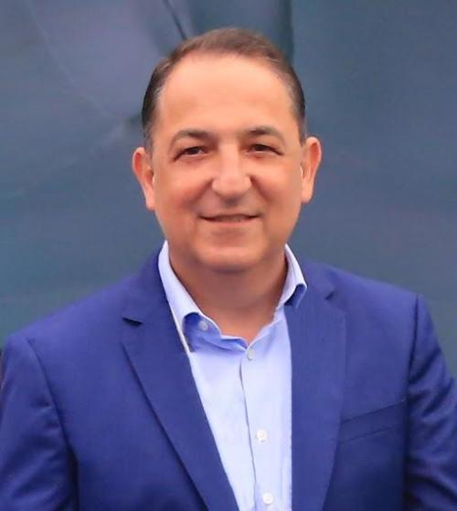 Adrian Siller Garza headshot.