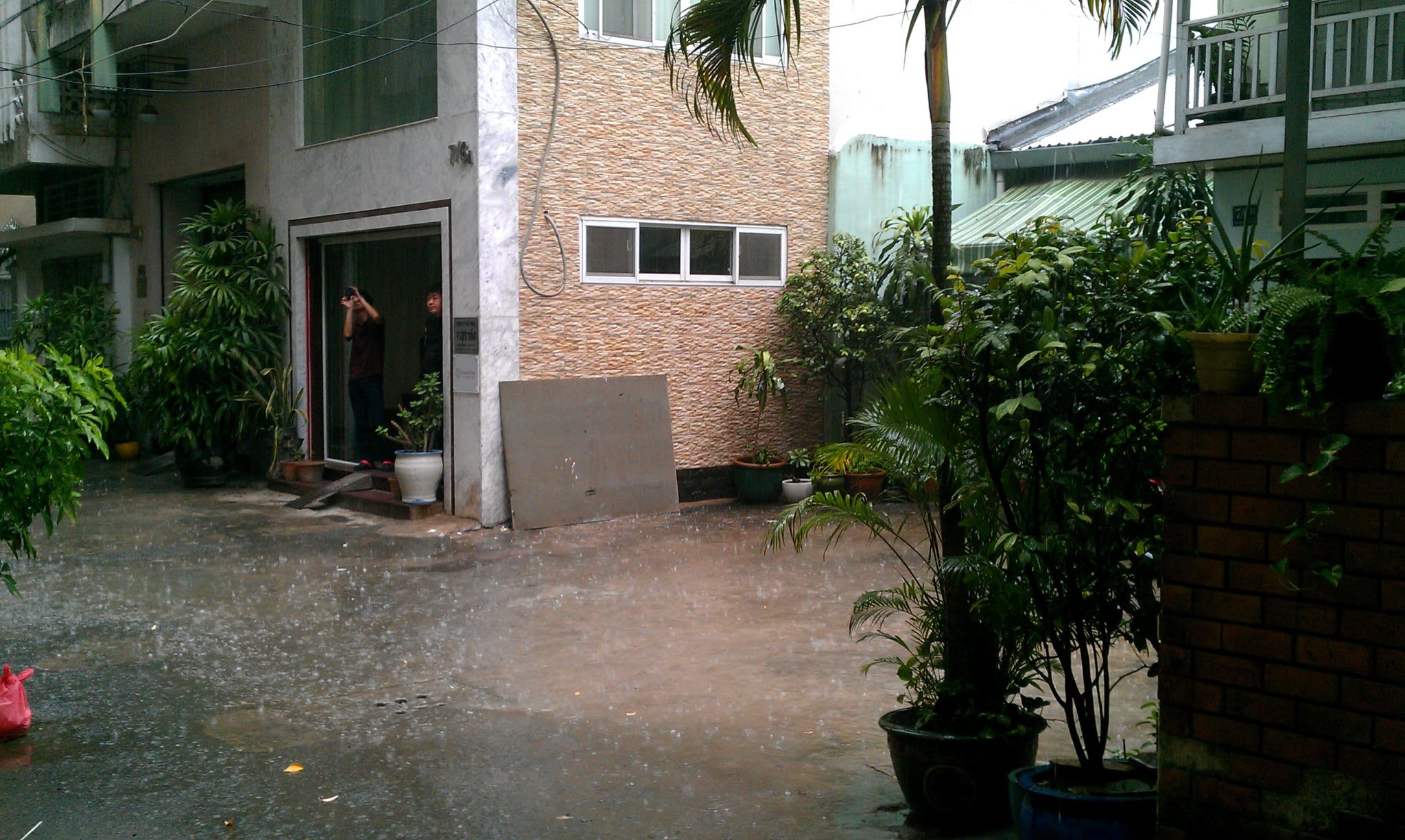 Heavy rain in front of my house - Saigon, Vietnam