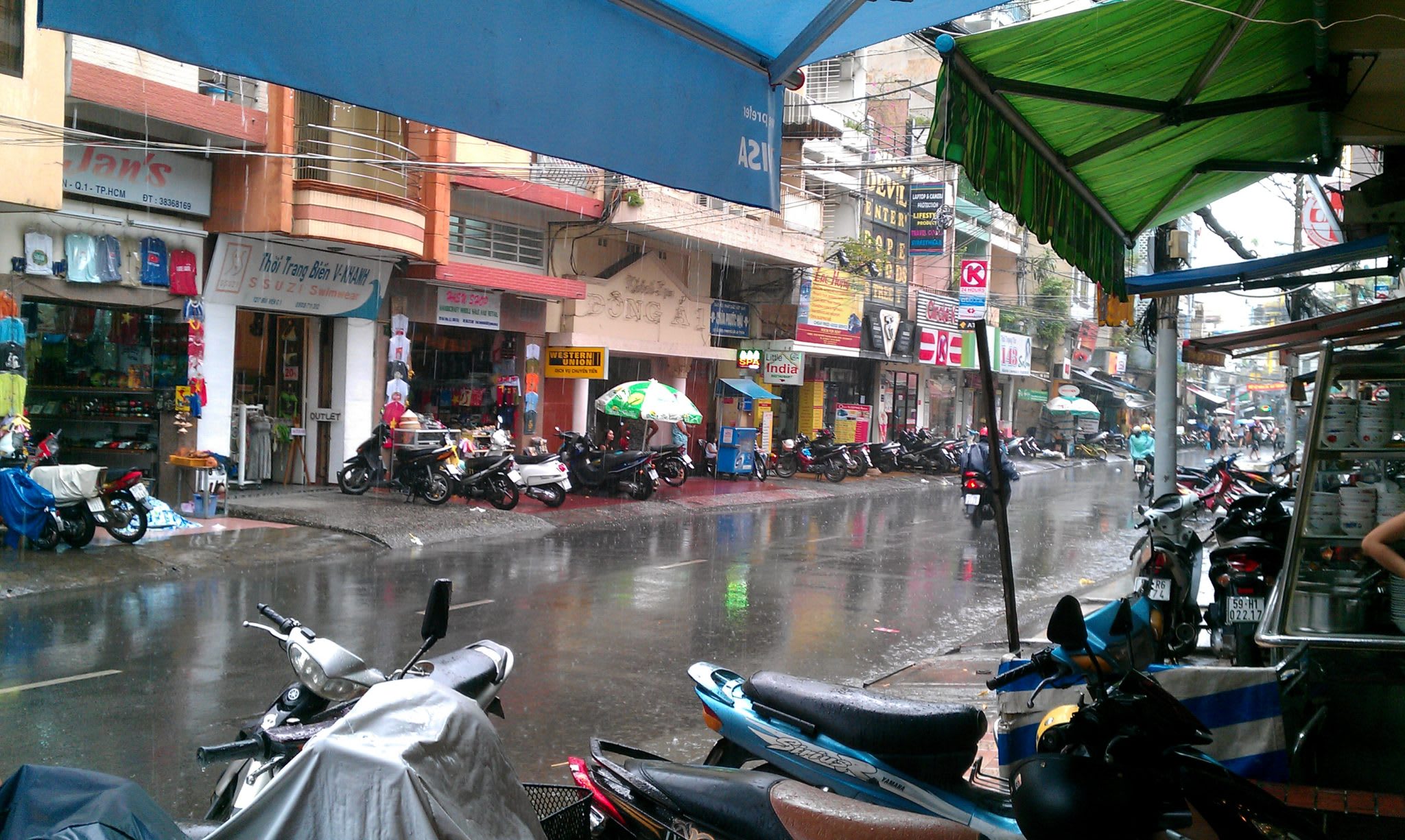 Heavy rain in front of Baba's Kitchen - Saigon, Vietnam