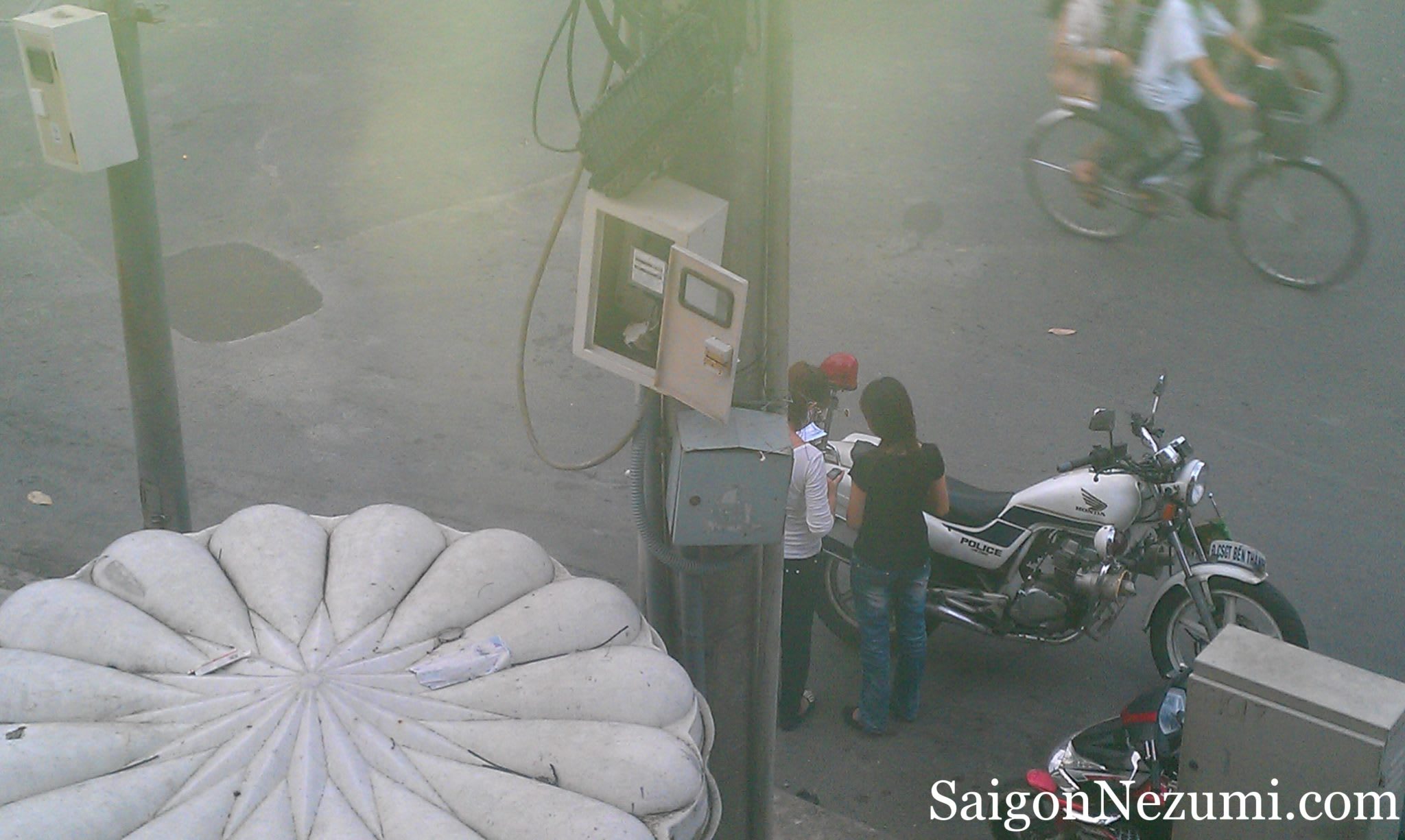 Helmets off, back to the traffic policeman's motorcycle