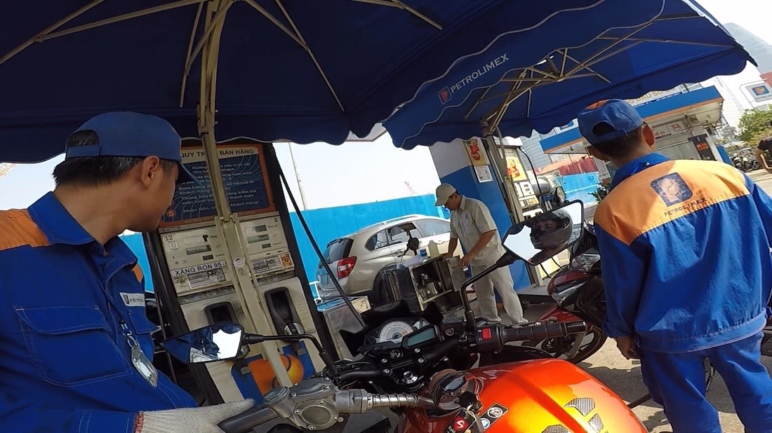 Filling up petrol at PetroLimex in Saigon 