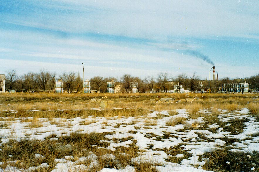 Demolished apartments and coal plant running in Karatau (1997)