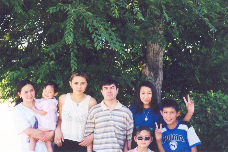 I am with Kazakh host family in June, 1999