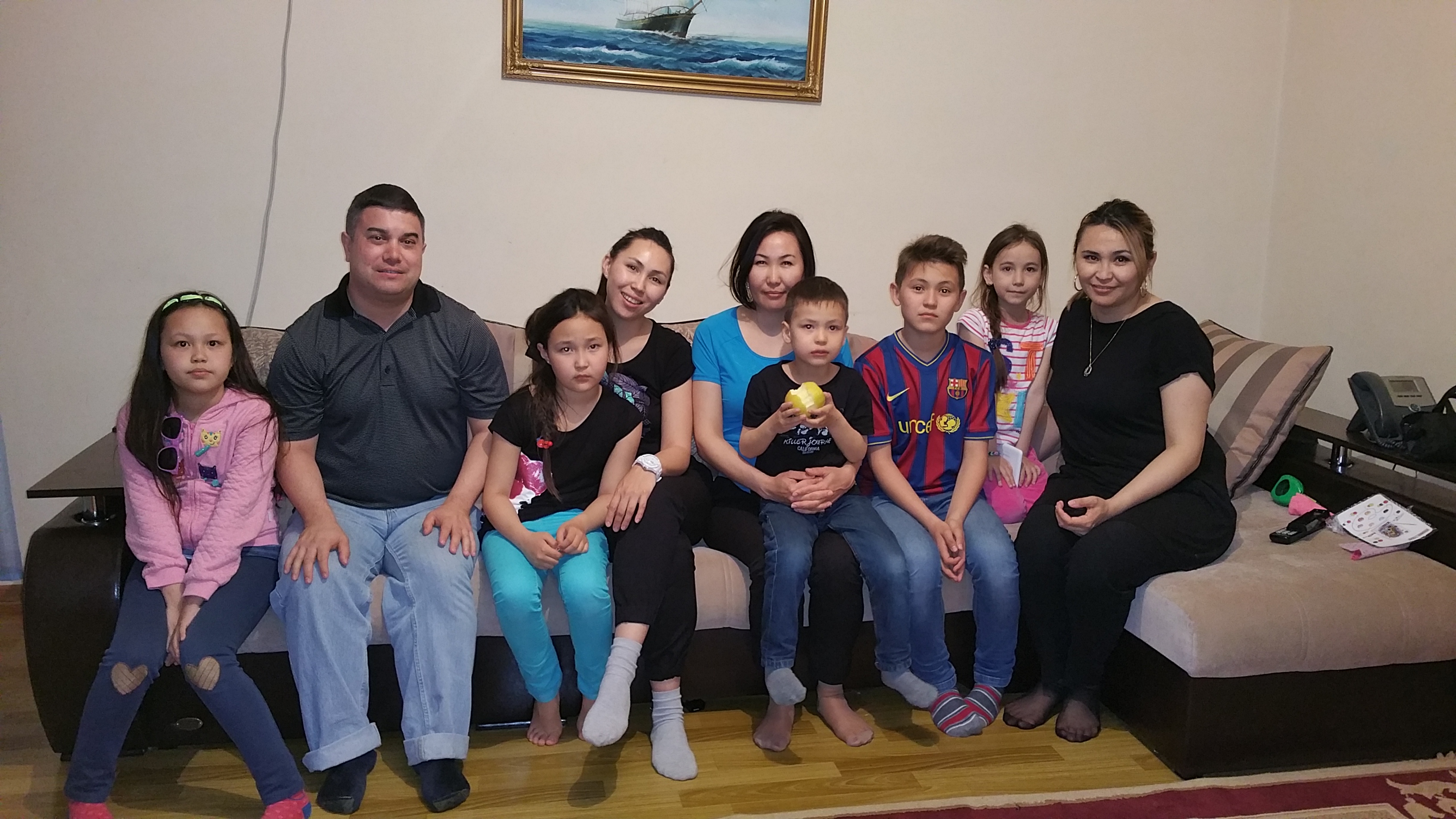 With my Kazakh host sisters and their children in Aktau, Kazakhstan