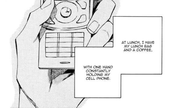 Close up of an early 2000s slider-style cell phone.