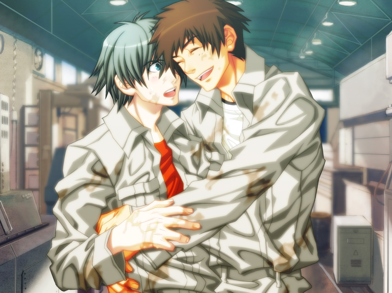 Akira and Keisuke hug in dirty coveralls.