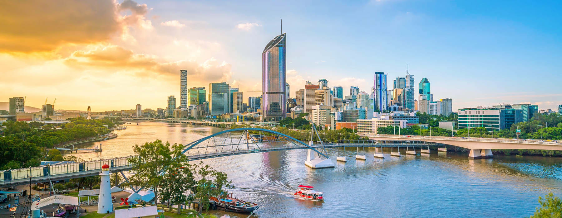 A view of Brisbane city skyline and Brisbane river at twilight after removals to Brisbane.