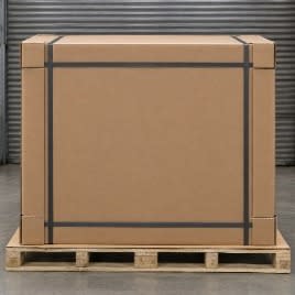 Pallet enclosed in a double-wall cardboard skin with edge protection.