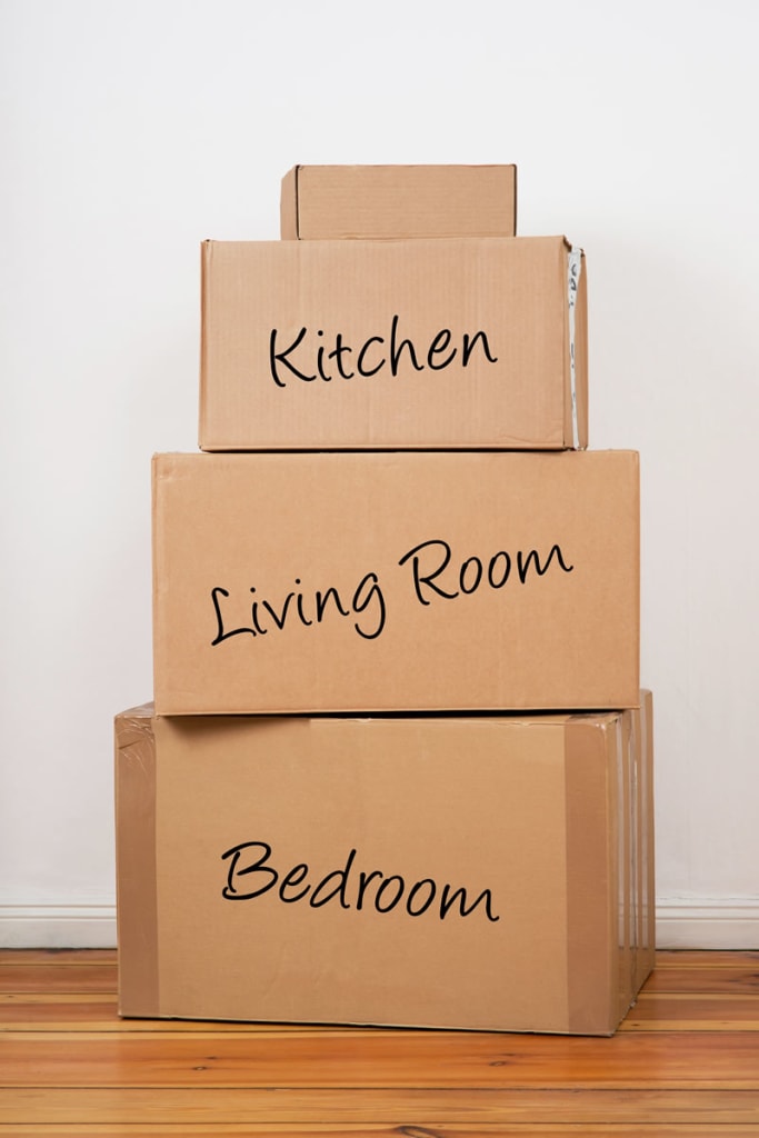 Packing boxes and household goods prepared for sea freight shipping to Australia