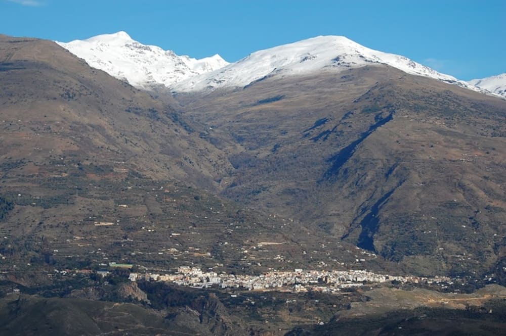 Town of Lanjaron with the Sierra Nevada mountains Rising behind