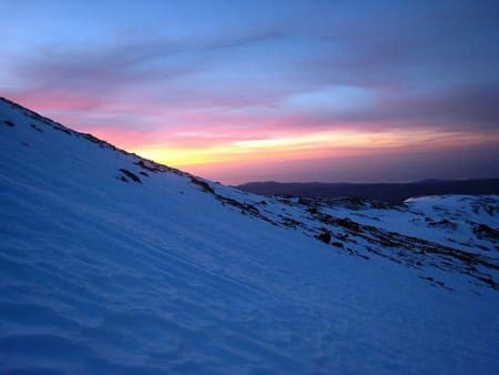 Brilliant sunrise following night ascent of Mulhacen, Spain