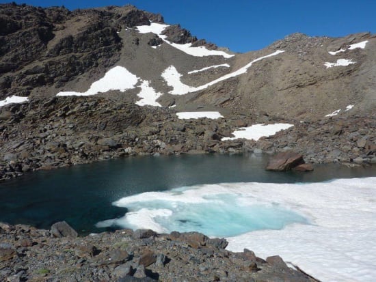 The icy Laguna Alta at Siete Lagunas