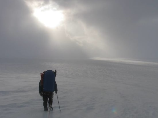 Reaching the icecap as the sun drops low in the evening sky