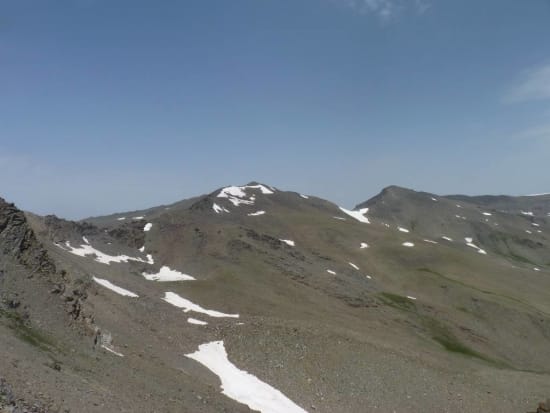 Snow covered Laguna de Vacares and the ridge north