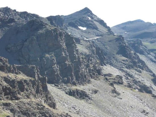 The prominent peak of Tajos Altos from the Refugio de Caballo