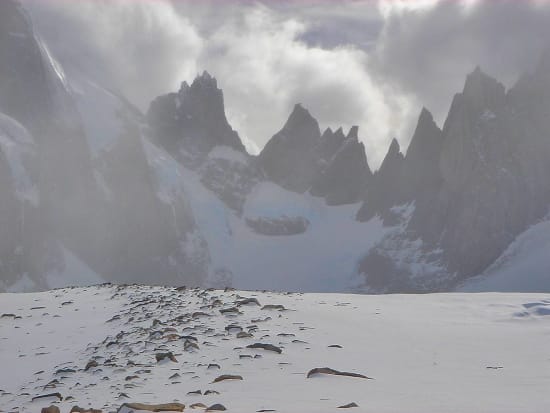 The jagged back of the cirque coming out of the mists