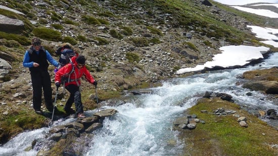 Crossing the Rio Juntillas in spate