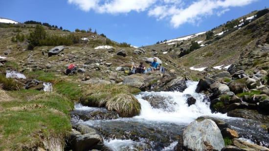 Relaxing by the Rio Chico en route to the Refugio Cebollar