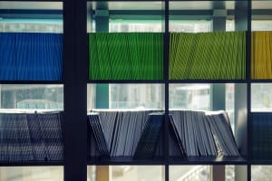 Shelves of multi-colored folders