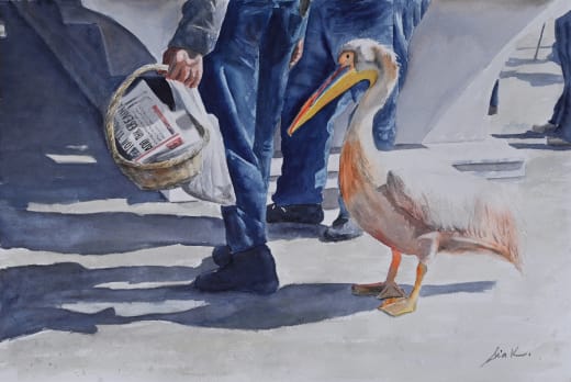 Watercolor of a pelican at a fish market.