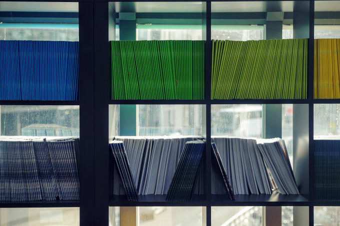 Shelves of multi-colored folders