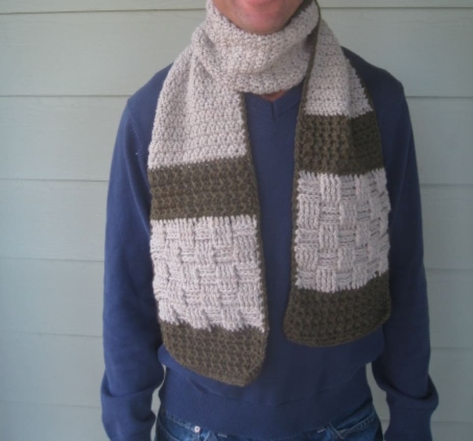 Man wearing a crochet scarf