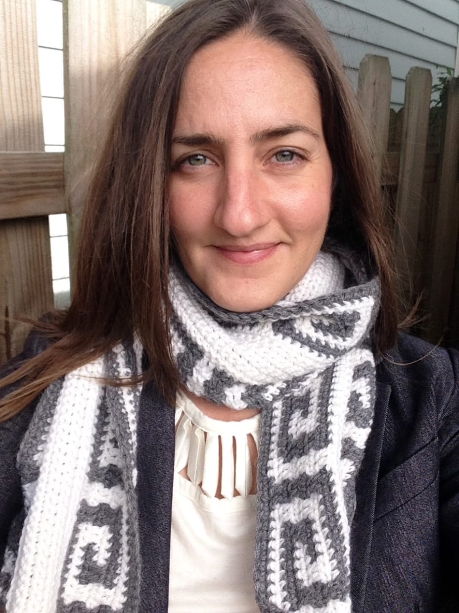 Greek woman in crochet scarf with a Greek key pattern